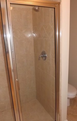 Tiled, walk-in shower in master bath.