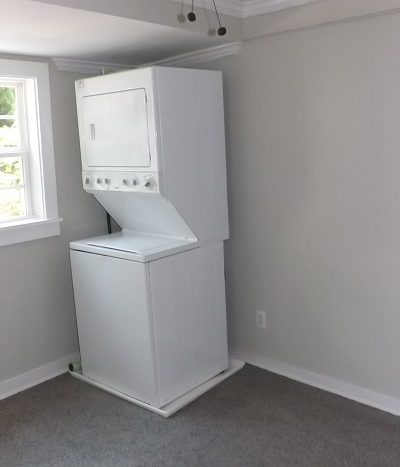 Laundry nook with stackable washer and dryer included